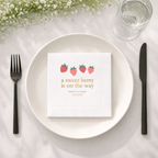 Close-up of the A Berry Sweet Baby Is On The Way design on personalized baby shower napkins