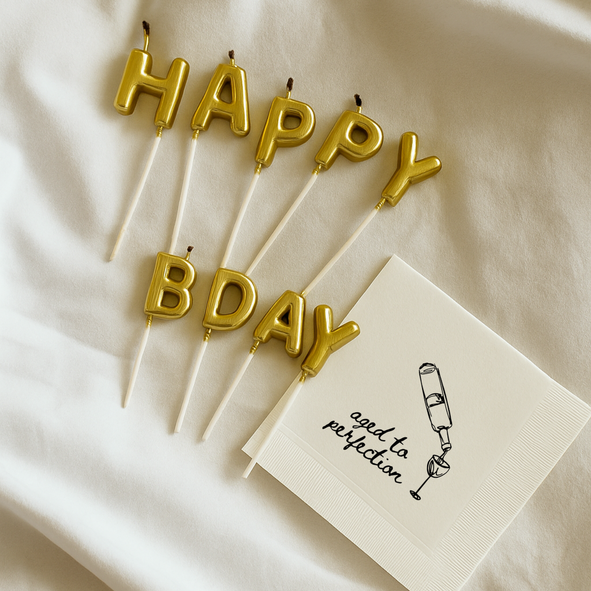 Close-up of the Aged to Perfection design on personalized birthday napkins