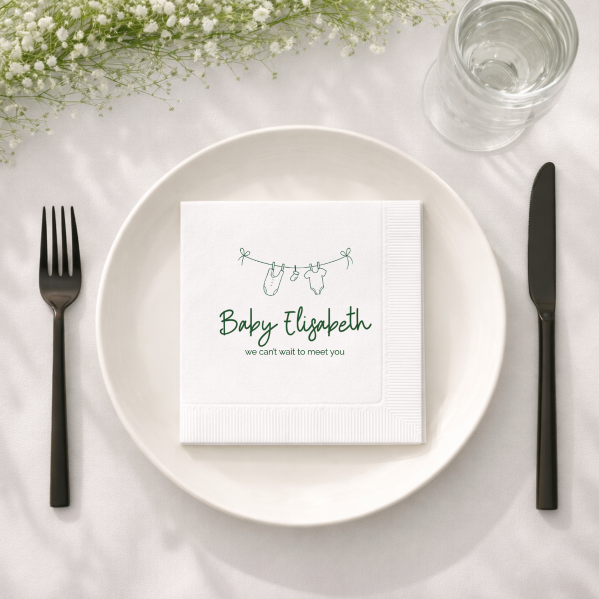 Close-up of the Baby Clothesline design on personalized baby shower napkins