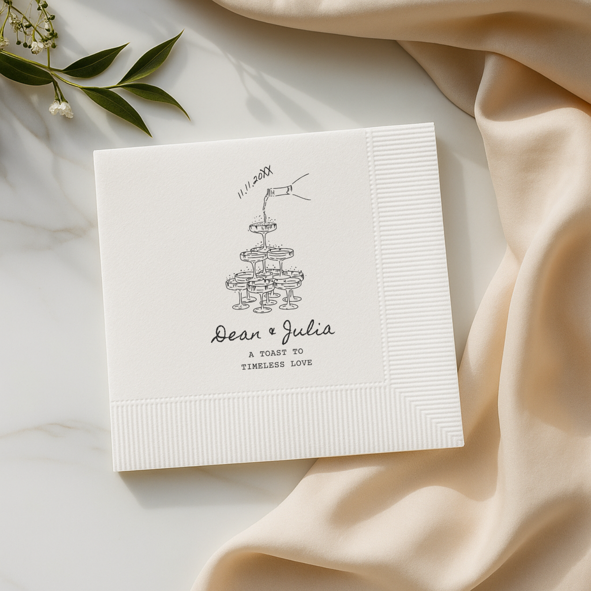 Close-up of the Champagne Tower Toast design on personalized wedding napkins