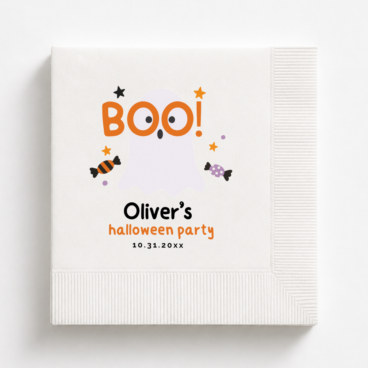 Kids Halloween napkins with a friendly ghost peeking through the word BOO and sweets around it