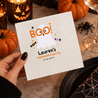Close-up of the friendly ghost peeking through BOO with candy and stars on personalized kids Halloween napkins