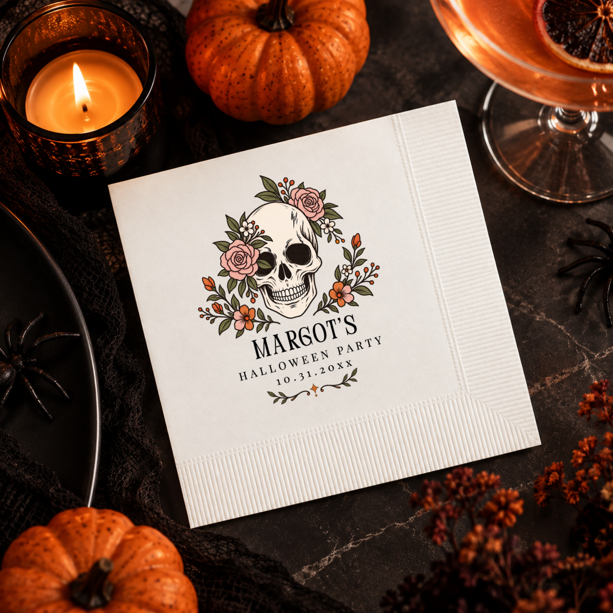 Halloween napkins personalized with your name and date, skull wreathed in roses and orange blooms