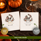 Personalized Halloween paper napkins with the skull wreathed in roses and orange blooms
