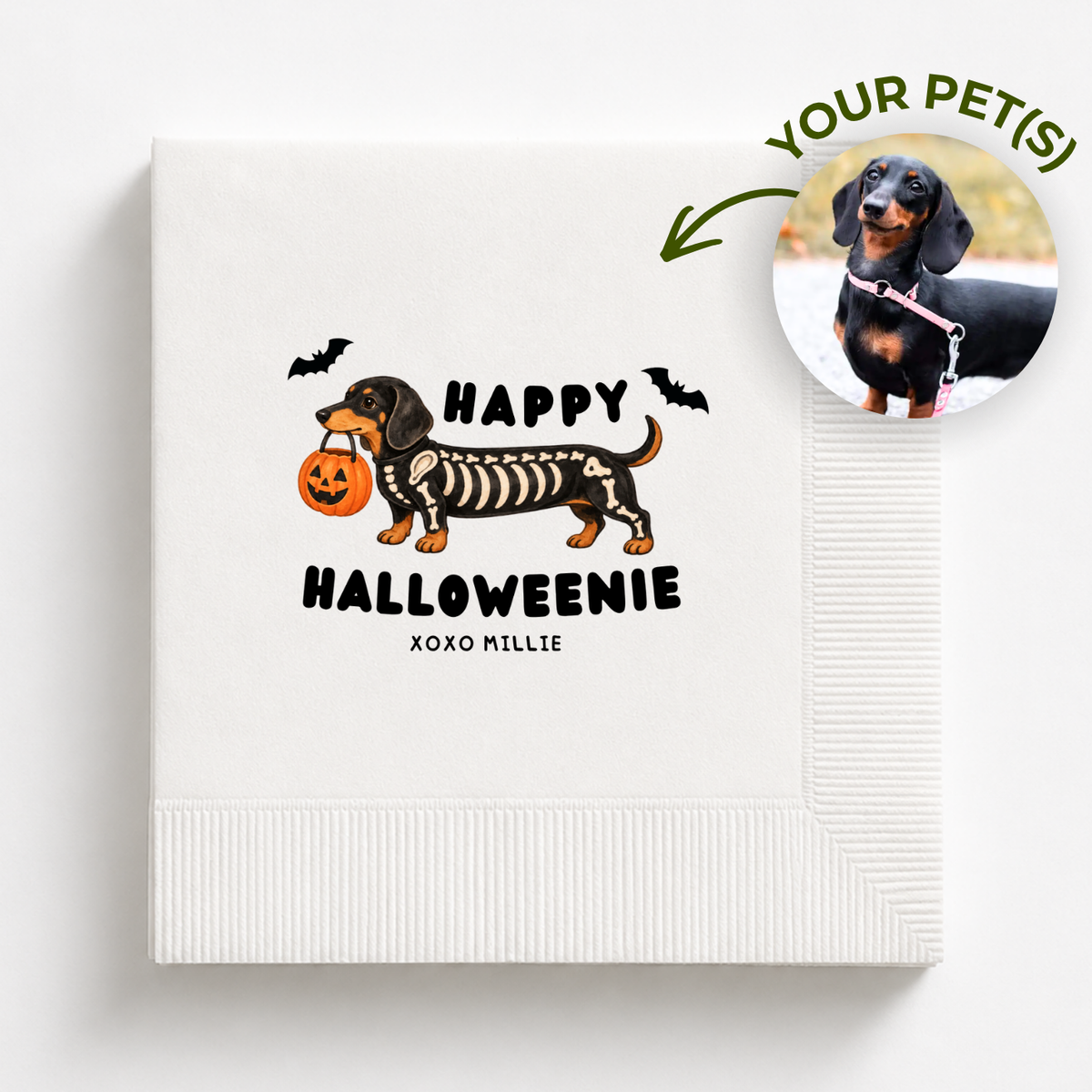 Personalized Halloween napkin with a dachshund in a skeleton costume carrying a pumpkin pail, Happy Halloweenie