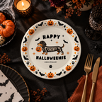 Close-up of the dachshund in a skeleton costume under Happy Halloweenie on personalized dachshund halloween paper plates
