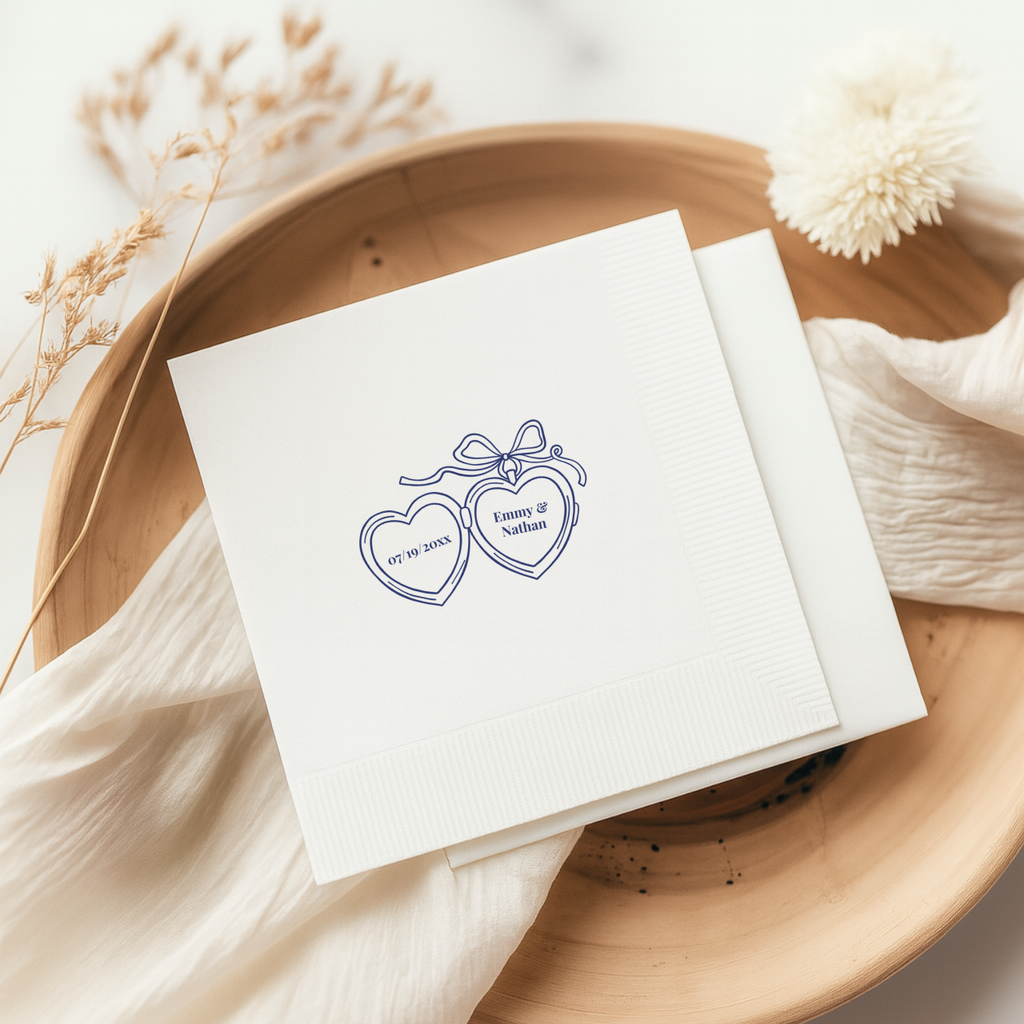 Wedding napkin with heart lockets and a ribbon bow
