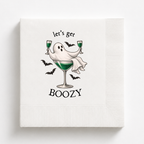 Lets Get Boozy Halloween napkins with a ghost draped over a coupe of green cocktail