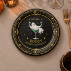 Ghost paper plates personalized with your name, the ghost lounging in a green cocktail with Lets Get Boozy