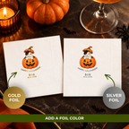 Close-up of the cat peeking out of a jack-o-lantern under Happy Meow-loween on personalized pumpkin cat napkins