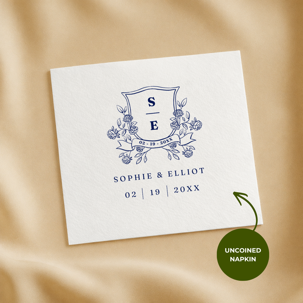 Monogram crest napkin with the couple's names and wedding date