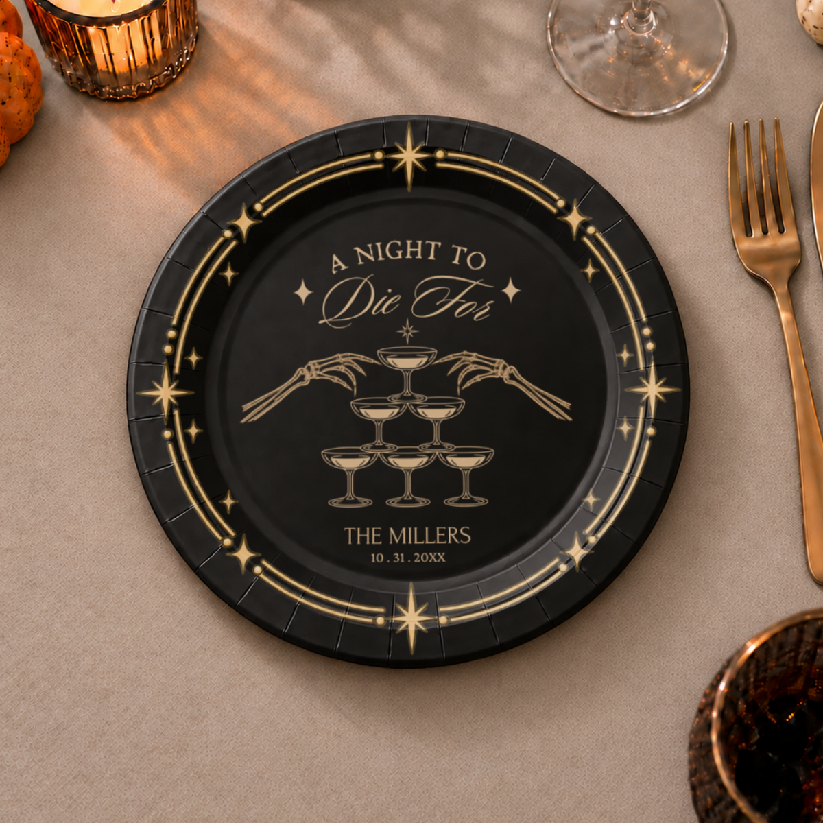 Black halloween paper plates personalized with your name, the gold champagne tower under A Night To Die For