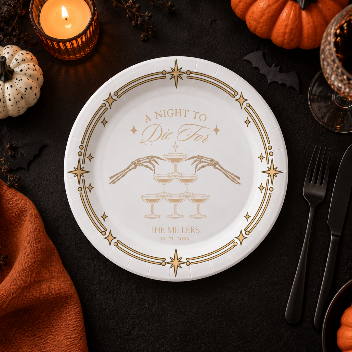 Close-up of the gold champagne tower under A Night To Die For on personalized black halloween paper plates