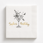 Skeleton martini birthday napkins with a skeleton in a party hat lounging in a martini glass