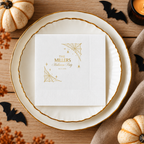Close-up of the spiderwebs in two corners with hanging spiders on personalized Halloween napkins