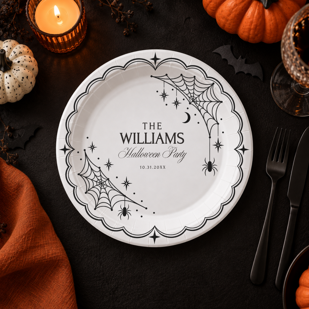 Custom spiderweb halloween paper plates for a Halloween party, white spiderwebs and hanging spiders on a black plate