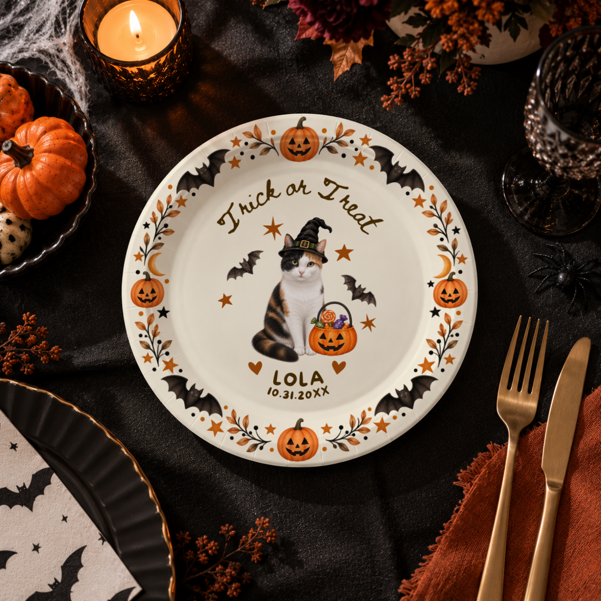 Close-up of the tabby cat in a witch hat with a candy pumpkin pail on personalized cat halloween paper plates