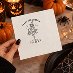 Halloween birthday napkins personalized with your name and date, witch sitting in a martini glass holding a broom