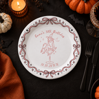 Custom witch birthday paper plates for a Halloween party, witch on a martini glass inside a pink ribbon and bow border